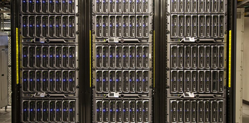 Servers on racks in a large computere server farm.
